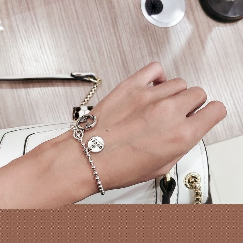 G*u*i bracelets
